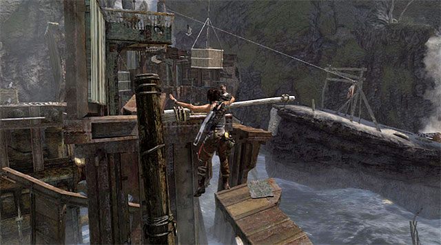 Jeżeli wybrałeś prawą ścianę, to po dotarciu na nową półkę obróć się w lewo - Dotrzyj do wraku okrętu Endurance (1) | 22 - Zaginiony | Solucja Tomb Raider - Tomb Raider - poradnik do gry