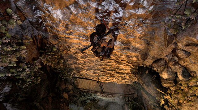 Eksplorację lokacji Research Base (Baza badawcza) rozpocznij od doskoczenia do interaktywnej ściany i użycia czekana - Odkryj pradawny grobowiec | 23 - Łowca burz | Solucja Tomb Raider - Tomb Raider - poradnik do gry