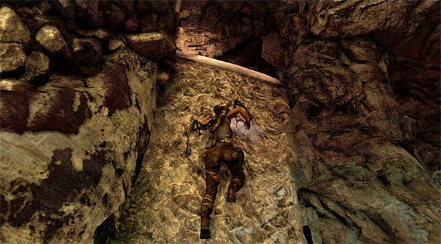 Przystąp do przemierzania częściowo zalanego korytarza, docierając po kilku chwilach do nowej interaktywnej ściany - Odkryj pradawny grobowiec | 23 - Łowca burz | Solucja Tomb Raider - Tomb Raider - poradnik do gry