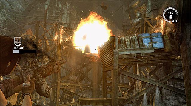 Bitwę tę najlepiej rozpocząć od wycelowania w pokazaną na screenie wybuchową beczkę - Opuść teren ośrodka badawczego | 23 - Łowca burz | Solucja Tomb Raider - Tomb Raider - poradnik do gry