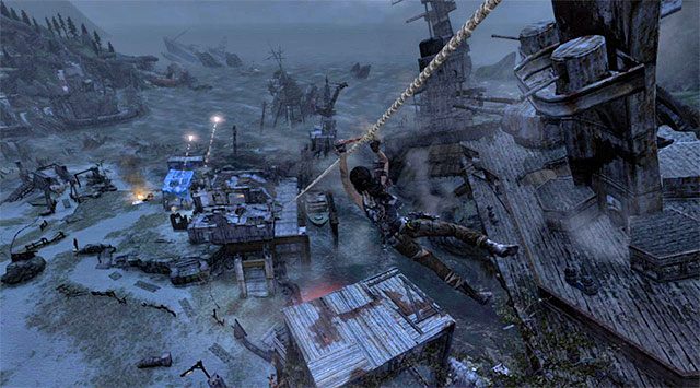 Po tym jak Lara wyląduje na nowej półce podejdź do kolejnej liny i złap się jej żeby zjechać do obozu rozbitków (nagroda: 100 punktów doświadczenia) - Powróć do obozu rozbitków znajdującego się na plaży | 23 - Łowca burz - Tomb Raider - poradnik do gry