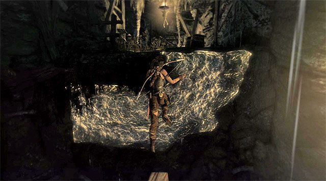 Po tym jak druga barykada zostanie zniszczona przebiegnij po poziomej belce i wykonaj skok w stronę interaktywnej ściany, wyciągając w odpowiednim momencie czekan (wciśnięcie przycisku/klawisza interakcji) - Opcjonalne grobowce - Summit Forest (las na szczycie) | Opcjonalne grobowce - Shantytown i Summit Forest - Tomb Raider - poradnik do gry