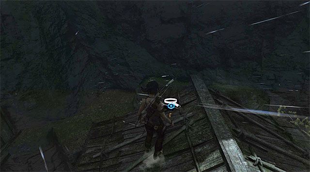 Po udanym lądowaniu na dachu chatki rozejrzyj się za pojemnikiem (nagroda: 5 punktów doświadczenia) - Geoskrzynki (08 - 15) | Sekrety - Mountain Village (Wioska w górach) - Tomb Raider - poradnik do gry