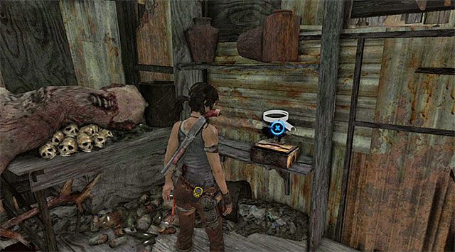 Skrzynka z figurką leży na półce (nagroda: 25 punktów doświadczenia) - Relikty | Sekrety - Shantytown (Miasto ubogich) | Sekrety Tomb Raider - Tomb Raider - poradnik do gry