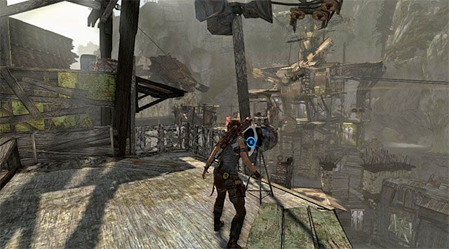 Alarm został rozstawiony tuż przy krawędzi półki i musisz naturalnie użyć na nim czekana (nagroda: 10 punktów doświadczenia) - Wileka cisza | Sekrety - Shantytown (Miasto ubogich) - Tomb Raider - poradnik do gry