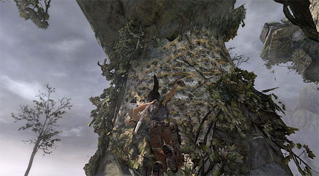 Wdrap się skały i przeskocz na przeciągniętą niedawną boję - Łupienie kopców | Sekrety - Shipwreck Beach (Plaża wraków) | Sekrety Tomb Raider - Tomb Raider - poradnik do gry