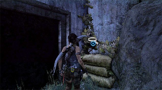 Mapa skarbów leży na workach z piaskiem po prawej stronie - Mapy skarbów | Sekrety - Cliffside Bunker | Sekrety Tomb Raider - Tomb Raider - poradnik do gry