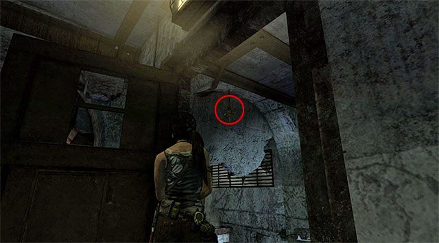 Po otwarciu drzwi podejdź do krawędzi i obróć się w lewo, a następnie wyceluj w wiszący przy suficie totem (nagroda: 10 punktów doświadczenia) - Zabójca Słońca | Sekrety - Research Base i Chasm Stronghold | Tomb Raider - Tomb Raider - poradnik do gry