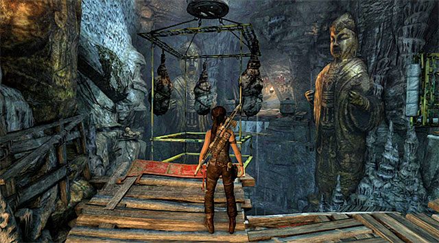 Zacznij od ustawienia się przed platformą z trzema zwisającymi kokonami - Grobowiec Niegodnych | Opcjonalne grobowce - Mountain Village | Tomb Raider - Tomb Raider - poradnik do gry
