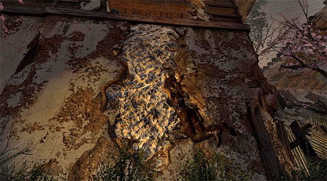 Przedostań się teraz w okolice reflektora, doskakując do interaktywnej ściany i wybierając z inwentarza czekan - Przebij się do wyjścia z pałacu | 17 - Prosto w ogień | Solucja Tomb Raider - Tomb Raider - poradnik do gry