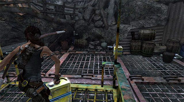Ustaw się na platformie i podnieś jeden z trzech leżących na niej kanistrów - Studnia Łez | Opcjonalne grobowce - Shantytown i Summit Forest | Tomb Raider - Tomb Raider - poradnik do gry
