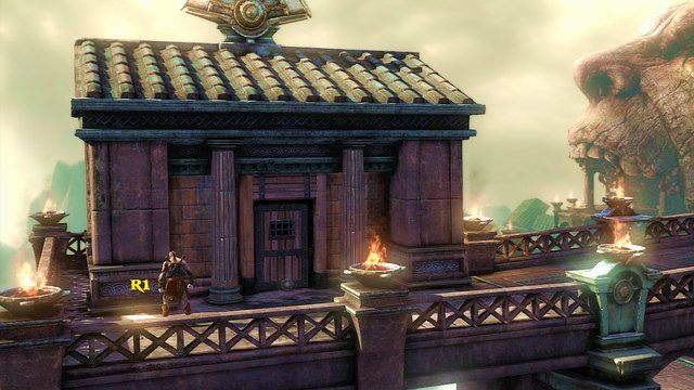 Udaj się mostem w lewo do samego końca aż natrafisz na niewielki budynek - 4 - Hekatonchejrowie | Opis przejścia | God of War Wstąpienie - God of War: Ascension - poradnik do gry