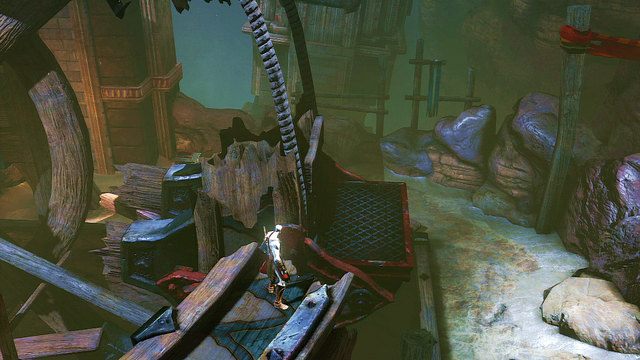 Musisz teraz szybko wskoczyć na zwaloną belkę po prawej i przeskoczyć z niej na łopatę koła młyńskiego (tą z czerwonym obiciem) - Ogień Aresa i młyńskie koło - God of War: Ascension - poradnik do gry