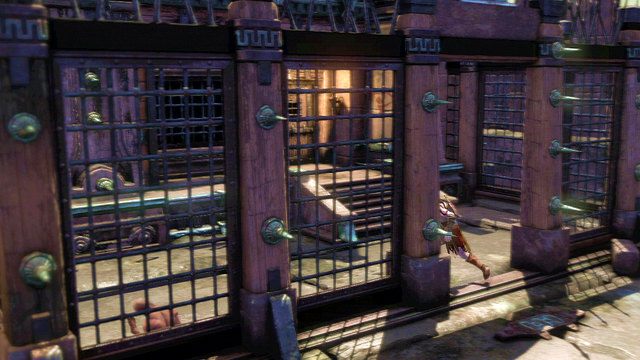Następnie udaj się w prawo i po chwili skręć lewo do budynku otoczonego kratą - 16 - Więzienie Potępionych - Ponownie | Opis przejścia | God of War Wstąpienie - God of War: Ascension - poradnik do gry