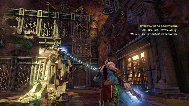 Złap teraz za męczennika i przeciągnij go w stronę metalowego urządzenia, które niedawno otworzyłeś - 17 - Komnata Męczennika | Opis przejścia | God of War Wstąpienie - God of War: Ascension - poradnik do gry