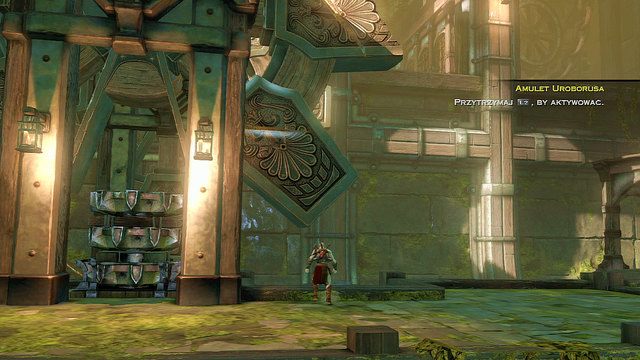 Zeskocz z powrotem na ziemię odblokuj drewniane koło zębate, przestaw dźwignię tym razem do końca w prawo, a następnie szybko zablokuj podestem koło zębate - Wnętrze posągu | God of War Wstąpienie - God of War: Ascension - poradnik do gry