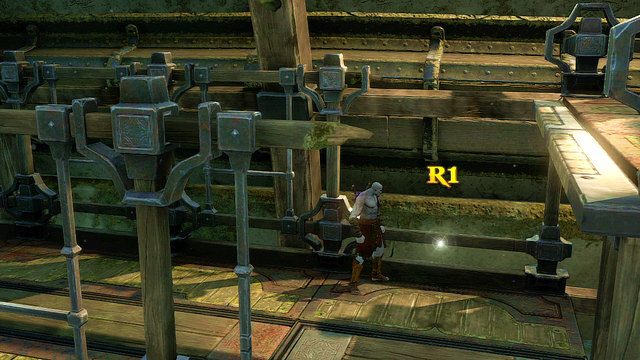 Udając się cały czas w prawo i w stronę ekranu trafisz na artefakt Dłuto Kamieniarza - 21 - Przedramię Apollona (1) | Opis przejścia | God of War Wstąpienie - God of War: Ascension - poradnik do gry