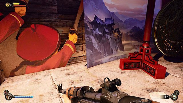 Tuż obok stołu znajduje się oparty o ścianę plakat i kryjący się za nim wytrych - Pokonaj ludzi Slatea | Rozdział 9 - Sala Bohaterów | BioShock Infinite - BioShock: Infinite - poradnik do gry