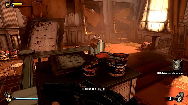 Przedmieścia Emporium, na stoliku z farbami w zamkniętym sklepie z obrazami, po lewej stronie alei - Rozdział 30-31 | Wyposażenie | BioShock Infinite - BioShock: Infinite - poradnik do gry