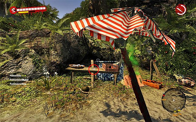 Zbadaj niewielki stolik przy dużym parasolu, zabierając leżący na nim przewodnik - Przewodniki - Dżungla - Dead Island Riptide - poradnik do gry