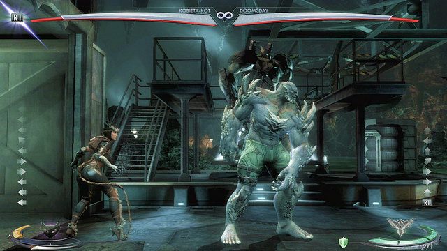 Po lewej stronie areny znajduje się winda - Injustice: Jaskinia Batmana - arena - Injustice Gods Among Us - poradnik do gry