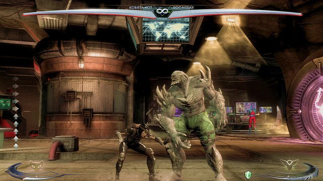 Po lewej i po prawej stronie środka areny znajdują się monitory zawieszone pod sufitem, aby do nich dosięgnąć należy podskoczyć - Injustice: Ruch Oporu - arena - Injustice Gods Among Us - poradnik do gry