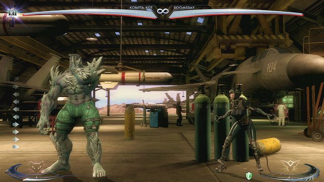 Po prawej stronie areny niedaleko środka znajdują się zielone butle z gazem - Injustice: Ferris Aircraft - arena - Injustice Gods Among Us - poradnik do gry