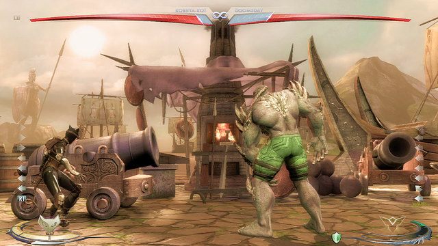 Na lewym krańcu areny znajduje się armata - Injustice: Themyscira - arena - Injustice Gods Among Us - poradnik do gry