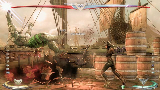 Na prawym krańcu areny znajdują się beczki - Injustice: Themyscira - arena - Injustice Gods Among Us - poradnik do gry