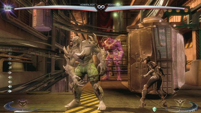 Po prawej stronie areny znajduje się metalowy kontener - Injustice: Wyspa Strykera - arena - Injustice Gods Among Us - poradnik do gry