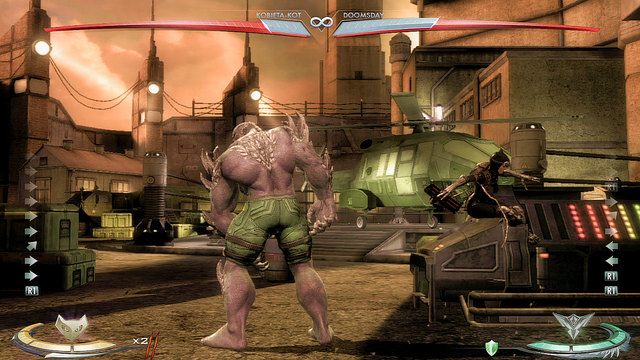 Na prawym krańcu areny znajduje się kontener z kolorowymi światełkami - Injustice: Wyspa Strykera - arena - Injustice Gods Among Us - poradnik do gry