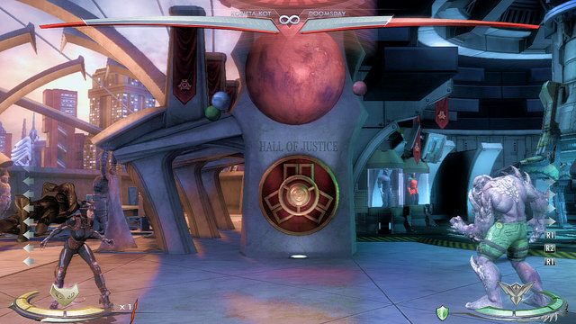 Na środku areny znajduje się model układu planet, aby z niego skorzystać należy podskoczyć - Injustice: Sala Sprawiedliwości - arena - Injustice Gods Among Us - poradnik do gry