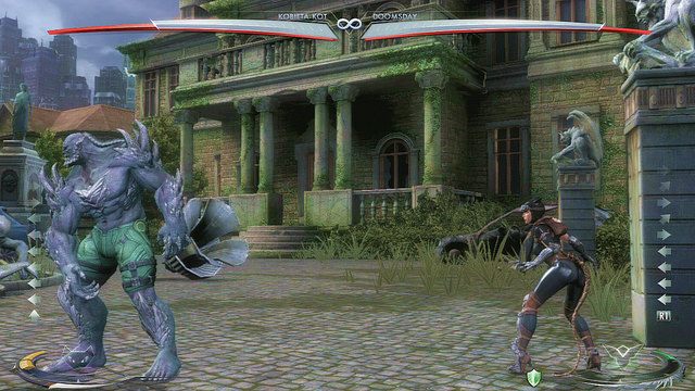 Na prawym krańcu areny znajduje się kolumna z gargulcem, aby z niej skorzystać należy podskoczyć - Injustice: Rezydencja Waynea, Rezydencja Waynea nocą - arena - Injustice Gods Among Us - poradnik do gry