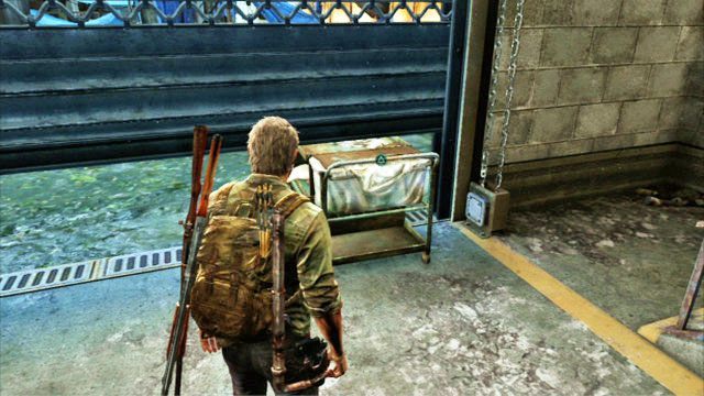 Ellie przejdzie szybko na drugą stronę i zablokuje wrota małym wózkiem - Dzielnica biznesowa | Pittsburgh | Solucja The Last of Us - The Last of Us - poradnik do gry