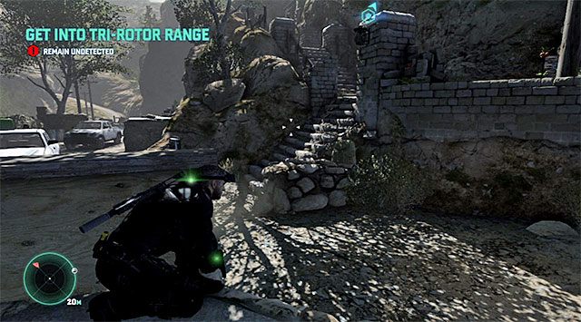 Przejdź do prawego wyjścia z chatki, zatrzymując się przy pokazanym na screenie niewielkim murku - Przedostanie się do miejsca przejęcia kontroli nad dronem | Misja 2 - Forteca partyzantów - Tom Clancys Splinter Cell: Blacklist - poradnik do gry