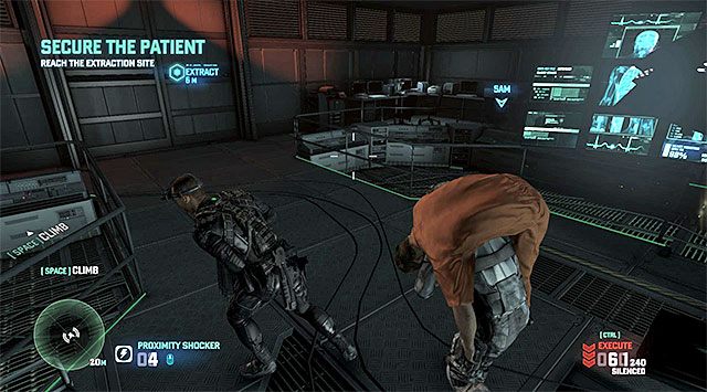 Jeden z graczy musi zacząć przenosić nieprzytomnego pacjenta - Misja 4 - Opuszczone miasto | Dodatkowe misje - Briggs | Splinter Cell Blacklist - Tom Clancys Splinter Cell: Blacklist - poradnik do gry
