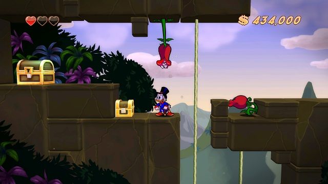 Wystarczy jeden nieuważny skok, aby dostać się wprost do paszczy krwiożerczej rośliny. - Droga na szczyt i lot helikopterem | Amazonia | DuckTales - DuckTales Remastered - poradnik do gry