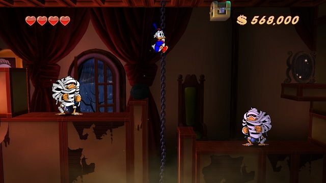 Na górze znajdujemy kolejne lustro, jednak na razie z niego nie korzystamy, chyba że chcemy całkowicie pogubić się w plątaninie czasoprzestrzeni. - Drugie, trzecie i czwarte piętro | Transylwania | DuckTales - DuckTales Remastered - poradnik do gry