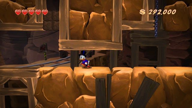 Te brązowe bloczki u góry coś mi przypominają. Jakbym już gdzieś to widział, hmm... - Dolne poziomy kopalni | Afrykańskie kopalnie | DuckTales - DuckTales Remastered - poradnik do gry