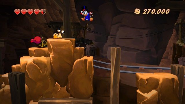 Właśnie widać jakie wspaniałe warunki pracy mieli Ci robotnicy. Czysty wyzysk! - Dolne poziomy kopalni | Afrykańskie kopalnie | DuckTales - DuckTales Remastered - poradnik do gry