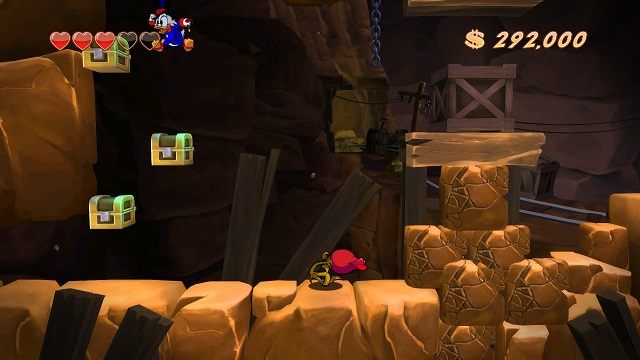 Niestety po schodkach ułożonych z kufrów nie dojdziemy do żadnej ukrytej komnaty. - Dolne poziomy kopalni | Afrykańskie kopalnie | DuckTales - DuckTales Remastered - poradnik do gry