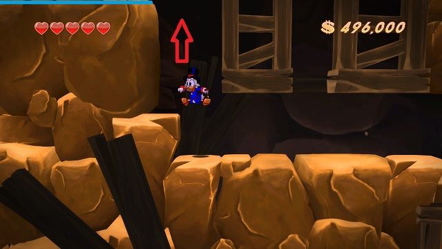 Na dole trafiamy na prostą dróżkę w prawo oraz z pozoru ślepy zaułek po lewej - Dolne poziomy kopalni | Afrykańskie kopalnie | DuckTales - DuckTales Remastered - poradnik do gry