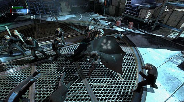 Musisz trzy razy pod rząd użyć peleryny żeby ogłuszyć silnie opancerzonego ochroniarza - Zbadaj hutę - eksploracja huty - Batman: Arkham Origins - poradnik do gry