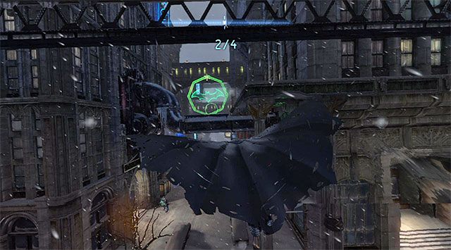 Zacznij od zanurkowania w stronę krawędzi zlokalizowanej tuż przy ścianie budynku, poniżej miejsca startu - System Mrocznego Rycerza - Batman: Arkham Origins - poradnik do gry