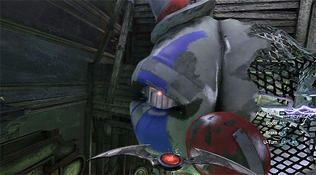 Możesz już zeskoczyć na dół, a to dlatego, że w obszarze z uwięzionymi postaciami zniknęły wyładowania - Dotarcie do apartamentu Jokera - zachodnia wieża - Batman: Arkham Origins - poradnik do gry