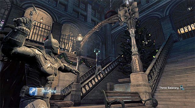 Użyj batarangu żeby uwolnić policjanta - Shiva - Batman: Arkham Origins - poradnik do gry