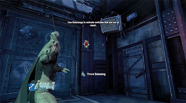 Ruszaj dalej, używając ponownie haka do ominięcia kolejnego zamkniętego przejścia i docierając do pomieszczenia rejestracji więźniów [Prisoner Processing] - Uzyskaj dostęp do sali egzekucji - Batman: Arkham Origins - poradnik do gry