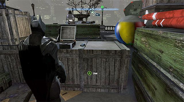 Po zakończonych walkach zlokalizuj krótkofalówkę, którą pozostawiono w pokazanym na screenie miejscu - Znajdź pierwszą kartę SIM, aby namierzyć Pingwina - Batman: Arkham Origins - poradnik do gry