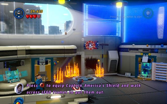 Kapitan Ameryka musi wrzucić w niego tarczą, w ten sposób odblokowując windę do góry - Times Square Off | Opis przejścia LEGO Marvel Super Heroes - LEGO Marvel Super Heroes - poradnik do gry