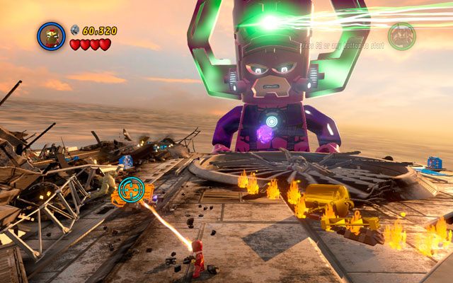 Po drugiej stronie pojazdu użyj laserowego działa Iron Mana, aby przepalić złoty klocek po lewej - The Good, the Bad and the Hungry | Opis przejścia LEGO Marvel Super Heroes - LEGO Marvel Super Heroes - poradnik do gry